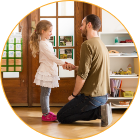 a Montessori guide and a Montessori students shaking hands